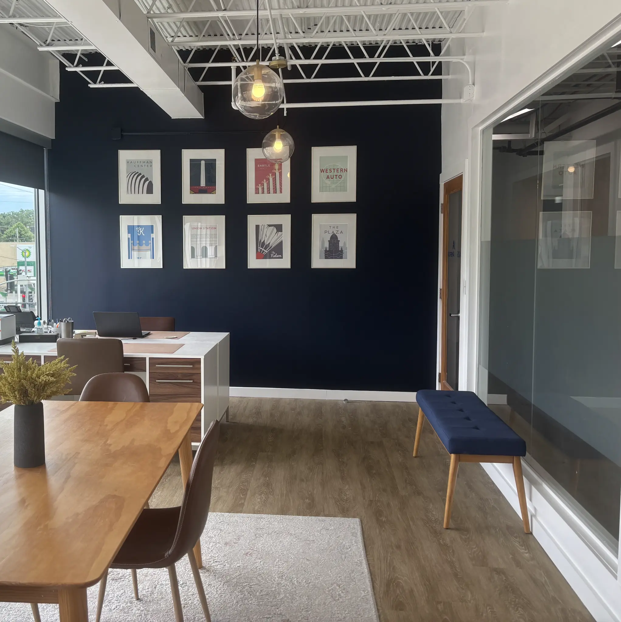 Heirloom Estate Planning office interior — Kansas City artwork wall, Brookside